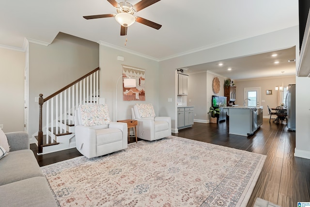 4486 Old Cahaba Pkwy, Helena, AL 35080 - living room with crown molding, dark wood finished floors, ceiling fan, stairway, and recessed lighting