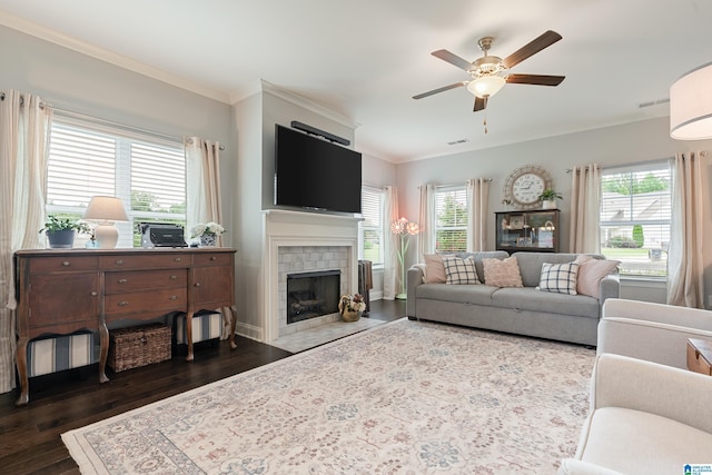 4486 Old Cahaba Pkwy, Helena, AL 35080 - living area featuring ceiling fan, dark wood-style flooring, healthy amount of natural light, a tiled fireplace, and ornamental molding