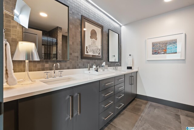 1801 2nd Ave N Unit 415, Birmingham, AL 35203 - bathroom with double vanity, tile patterned flooring, and recessed lighting