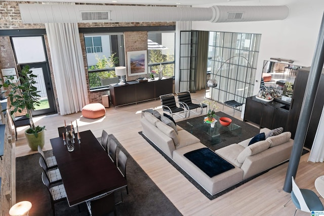 1801 2nd Ave N Unit 415, Birmingham, AL 35203 - living area featuring wood finished floors