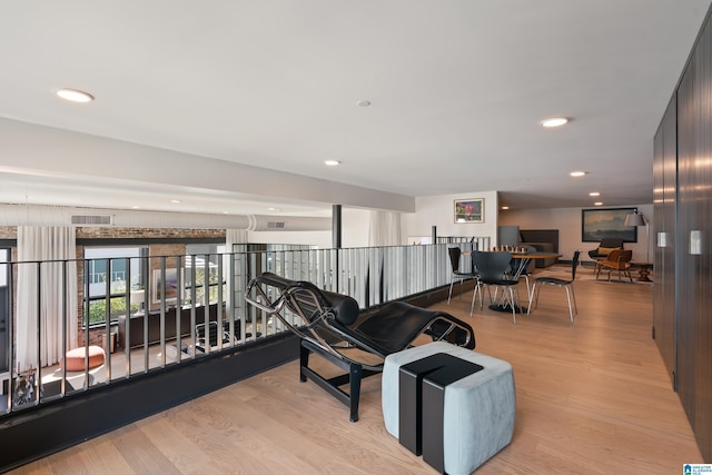 1801 2nd Ave N Unit 415, Birmingham, AL 35203 - living area with light wood-style flooring and recessed lighting