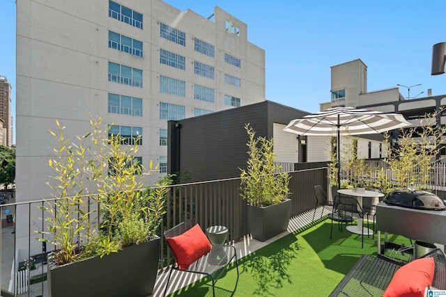 1801 2nd Ave N Unit 415, Birmingham, AL 35203 - view of yard with a balcony
