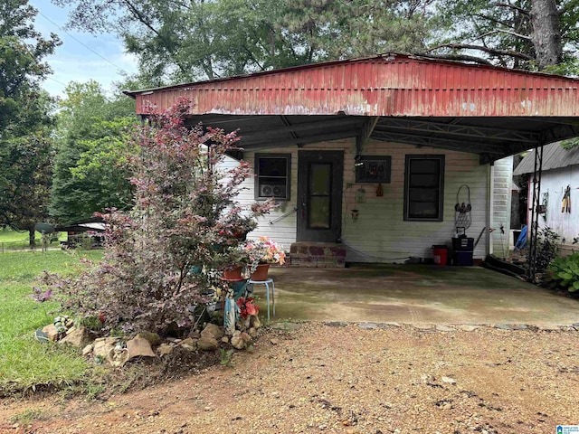 92 Briar Hill Loop, Wetumpka, AL 36092 - view of front of home with entry steps and a carport