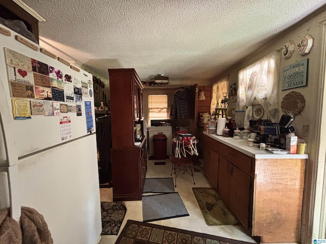 92 Briar Hill Loop, Wetumpka, AL 36092 - kitchen with a textured ceiling, light countertops, and light floors