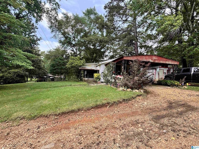 92 Briar Hill Loop, Wetumpka, AL 36092 - view of grassy yard featuring dirt driveway