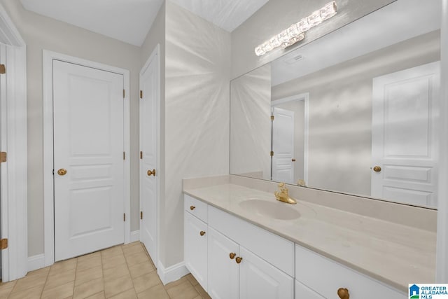 5557 Lakes Edge Dr, Hoover, AL 35242 - bathroom featuring vanity and tile patterned flooring