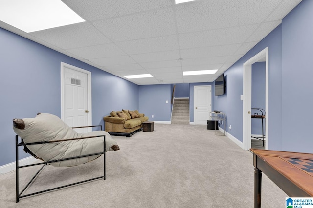 5557 Lakes Edge Dr, Hoover, AL 35242 - sitting room with carpet floors, a drop ceiling, and stairway