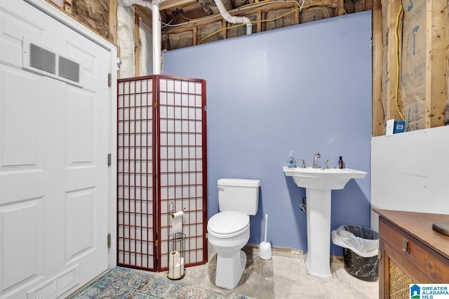 5557 Lakes Edge Dr, Hoover, AL 35242 - bathroom with toilet and concrete flooring