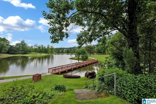 5557 Lakes Edge Dr, Hoover, AL 35242 - dock featuring a water view and a lawn