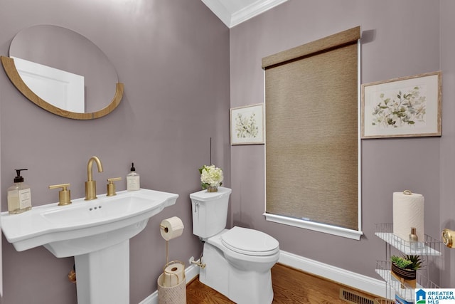 5557 Lakes Edge Dr, Hoover, AL 35242 - bathroom featuring ornamental molding and wood finished floors