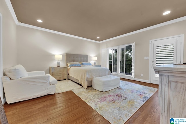 5557 Lakes Edge Dr, Hoover, AL 35242 - bedroom featuring ornamental molding, wood finished floors, access to outside, and recessed lighting