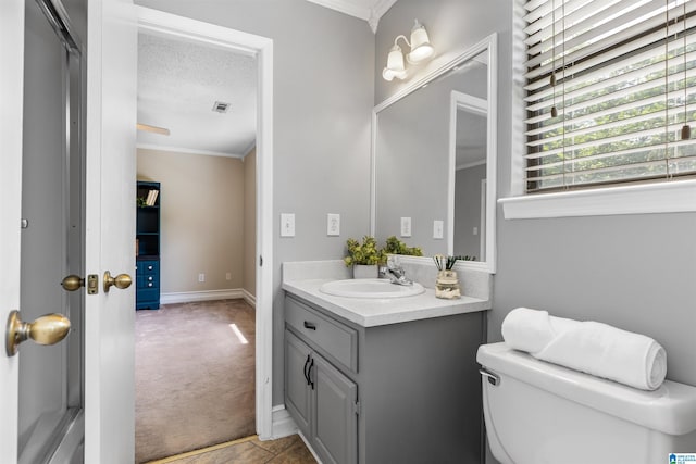 505 Waterside Cir, Mccalla, AL 35111 - bathroom featuring vanity, crown molding, and a textured ceiling