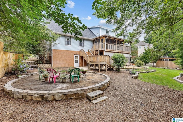 505 Waterside Cir, Mccalla, AL 35111 - rear view of house with a fire pit, stairs, brick siding, a patio area, and a wooden deck