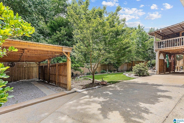 505 Waterside Cir, Mccalla, AL 35111 - fenced yard with driveway and a detached carport