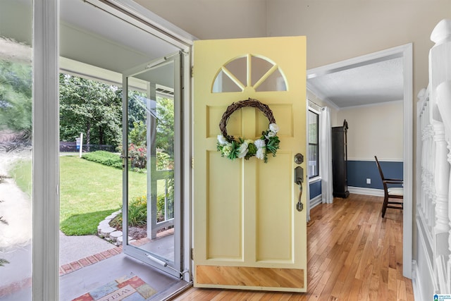 505 Waterside Cir, Mccalla, AL 35111 - foyer with light wood-style flooring, plenty of natural light, and crown molding