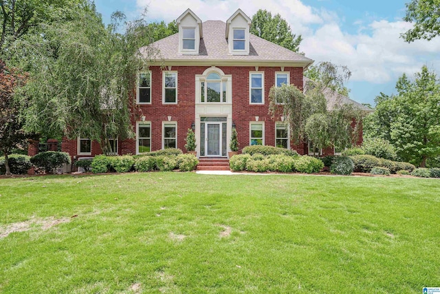 3357 Afton Ln, Birmingham, AL 35242 - colonial-style house featuring brick siding and a front lawn
