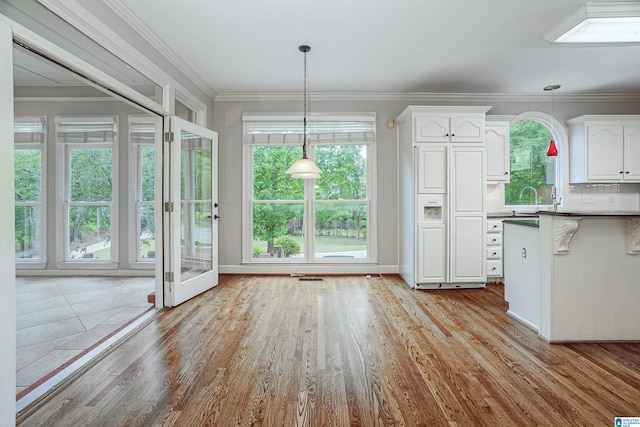 3357 Afton Ln, Birmingham, AL 35242 - unfurnished dining area with wood finished floors and ornamental molding