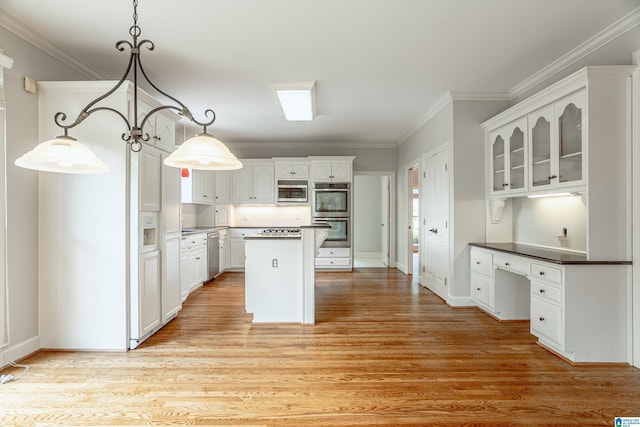 3357 Afton Ln, Birmingham, AL 35242 - kitchen featuring stainless steel appliances, white cabinetry, glass insert cabinets, light wood-style floors, and a center island