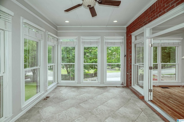 3357 Afton Ln, Birmingham, AL 35242 - unfurnished sunroom featuring crown molding and brick wall