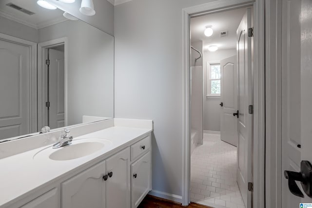 3357 Afton Ln, Birmingham, AL 35242 - full bath featuring vanity, ornamental molding, tile patterned flooring, and shower / tub combination