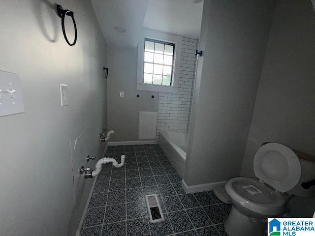 1511 43rd St, Birmingham, AL 35208 - bathroom with tile patterned flooring and bathing tub / shower combination