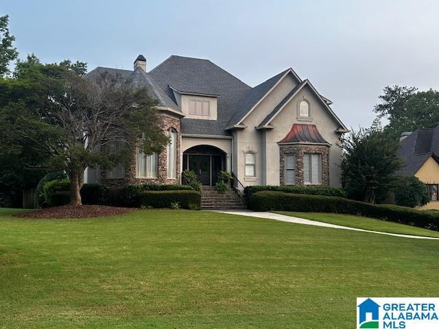 4067 Milners Cres, Hoover, AL 35242 - french country home with a front lawn and a standing seam roof