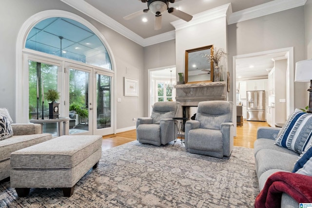 4067 Milners Cres, Hoover, AL 35242 - living room featuring ceiling fan, crown molding, french doors, recessed lighting, and light wood-style floors