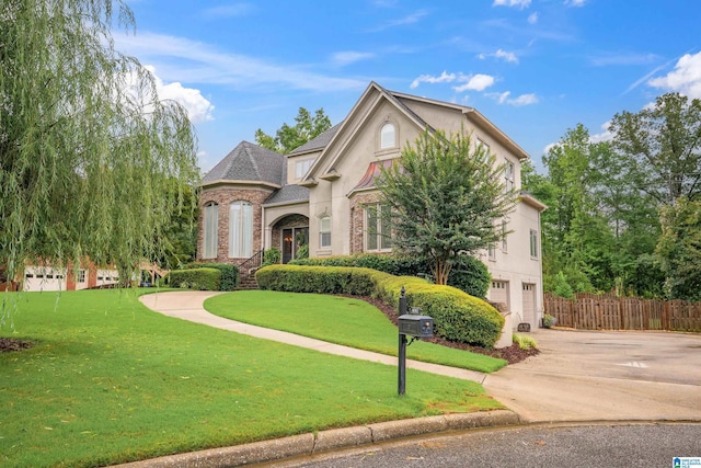 4067 Milners Cres, Hoover, AL 35242 - view of front of home featuring a garage, stone siding, concrete driveway, stucco siding, and a shingled roof