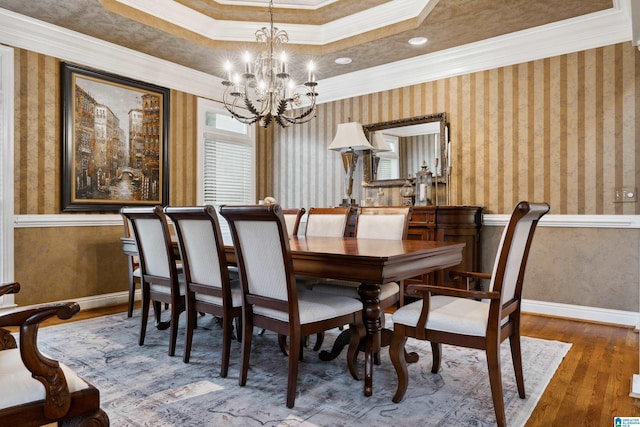 4067 Milners Cres, Hoover, AL 35242 - dining space featuring hardwood / wood-style flooring, ornamental molding, a chandelier, and wallpapered walls