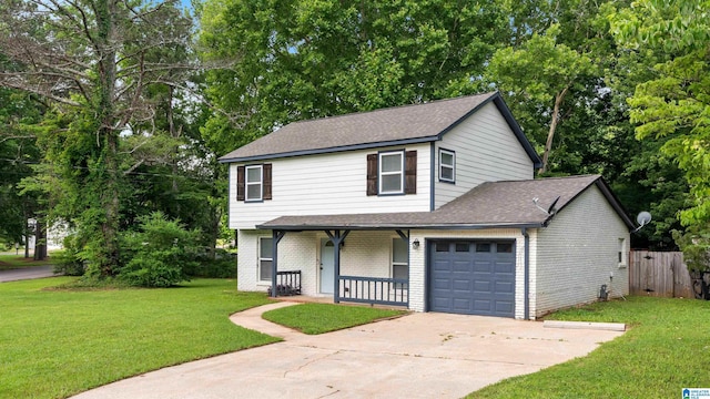 2653 NE Janice Cir, Birmingham, AL 35235 - view of front of home featuring covered porch, concrete driveway, an attached garage, and brick siding
