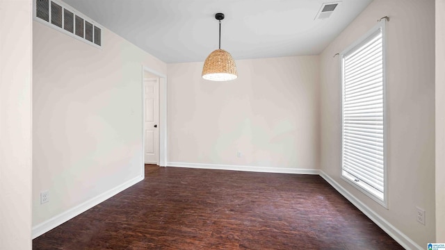 2653 NE Janice Cir, Birmingham, AL 35235 - unfurnished dining area with dark wood-type flooring and baseboards