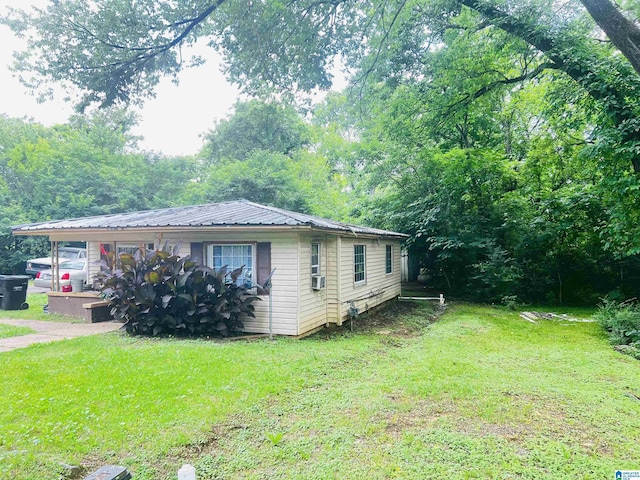 1916 Crescent Ave, Lipscomb, AL 35020 - view of property exterior featuring a lawn and a metal roof