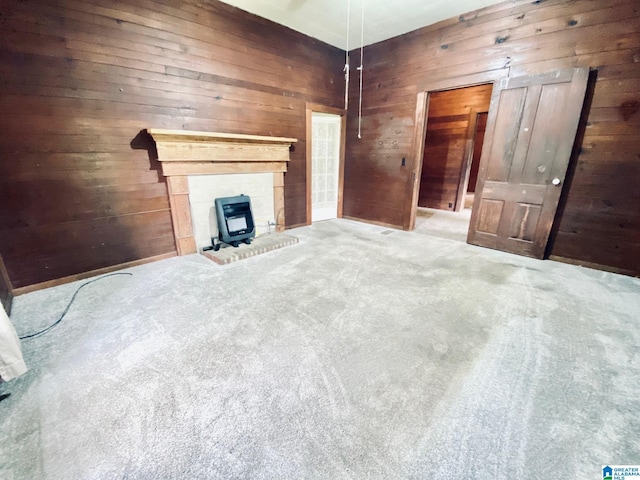 672 Websters Chapel Rd, Wellington, AL 36279 - unfurnished living room featuring wood walls and carpet flooring