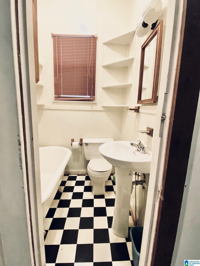 672 Websters Chapel Rd, Wellington, AL 36279 - full bath featuring tile patterned floors and a freestanding tub