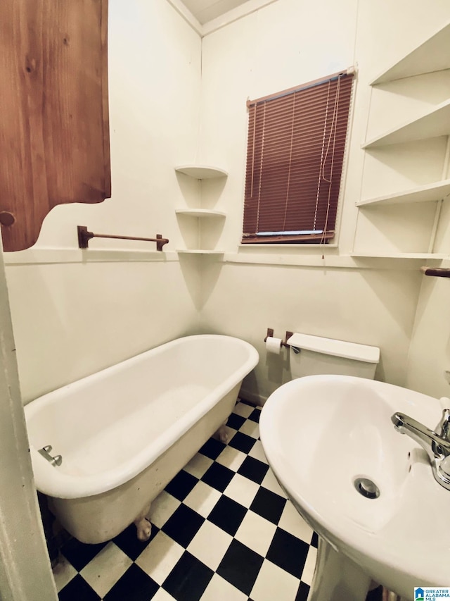 672 Websters Chapel Rd, Wellington, AL 36279 - bathroom with tile patterned floors and a freestanding tub