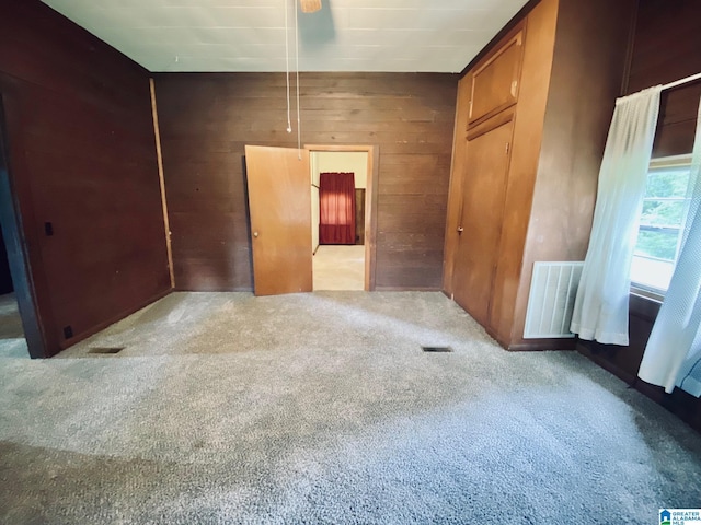 672 Websters Chapel Rd, Wellington, AL 36279 - carpeted spare room with wood walls