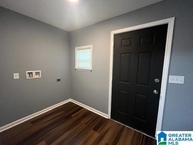 2732 29th St, Birmingham, AL 35208 - laundry room with washer hookup, dark wood-type flooring, and electric dryer hookup