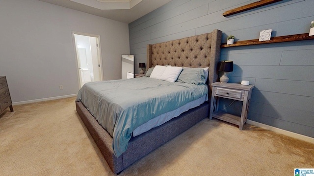 2049 Forest Lakes Ln, Sterrett, AL 35147 - bedroom with carpet floors, wood walls, and connected bathroom