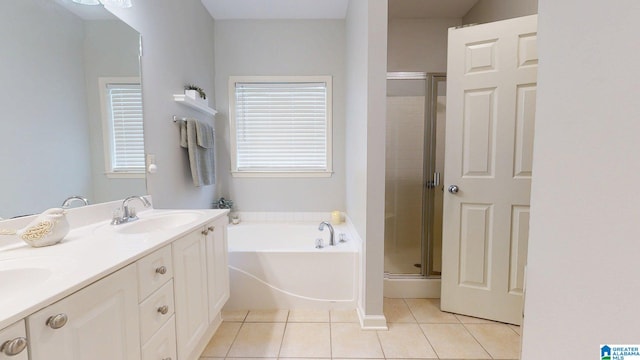 2049 Forest Lakes Ln, Sterrett, AL 35147 - full bathroom featuring a stall shower, a bath, tile patterned floors, and double vanity