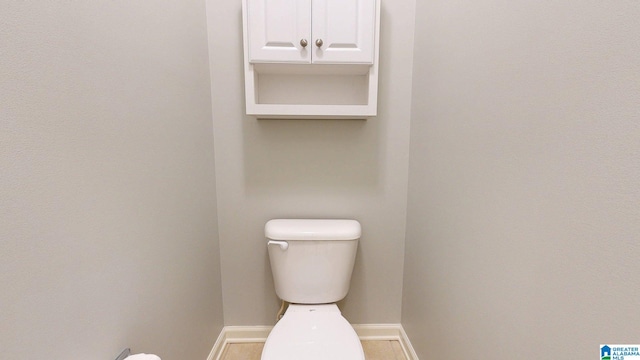2049 Forest Lakes Ln, Sterrett, AL 35147 - bathroom featuring baseboards and toilet
