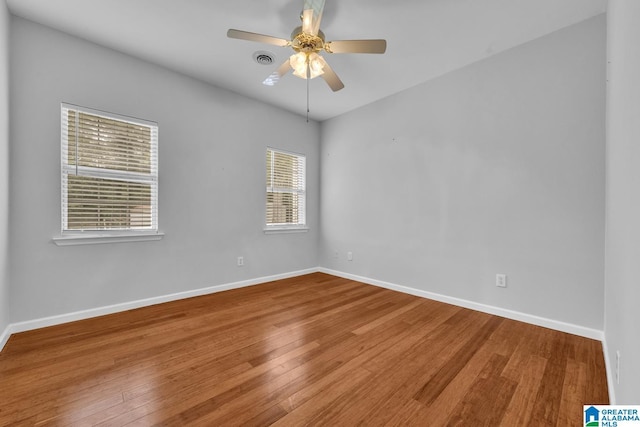 7741 John Pelham Trl, Mccalla, AL 35111 - unfurnished room with wood finished floors and a ceiling fan