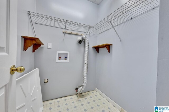 7741 John Pelham Trl, Mccalla, AL 35111 - washroom with washer hookup and tile patterned floors