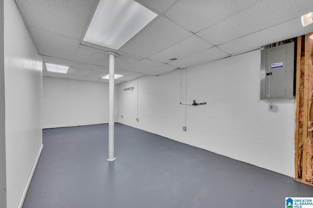 7741 John Pelham Trl, Mccalla, AL 35111 - finished below grade area with electric panel, concrete block wall, and a paneled ceiling