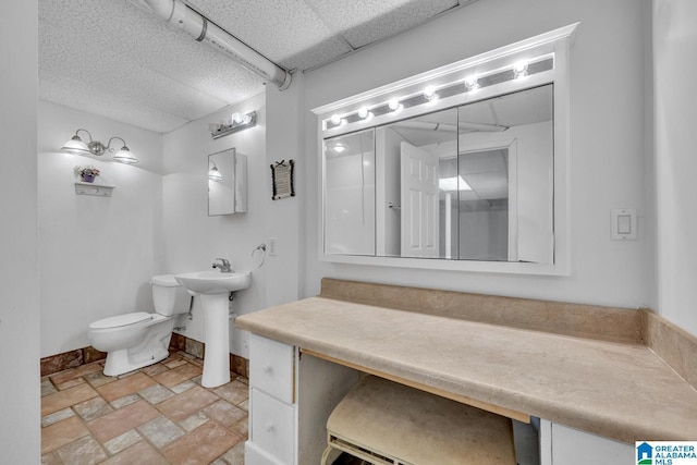 7741 John Pelham Trl, Mccalla, AL 35111 - bathroom featuring stone finish flooring and toilet