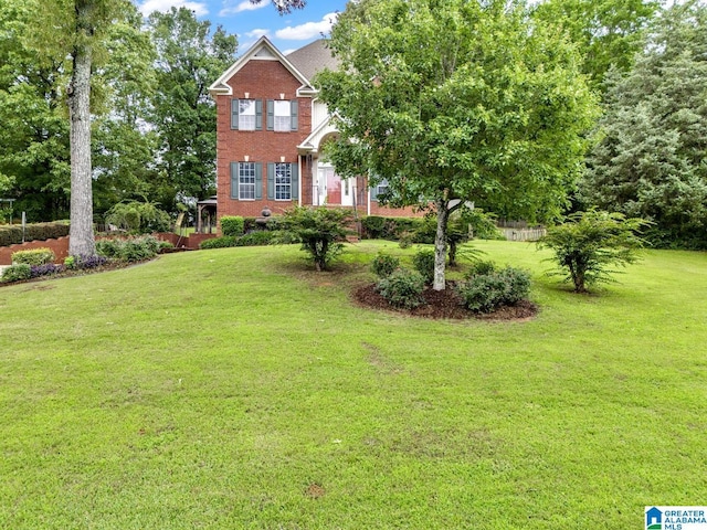 7741 John Pelham Trl, Mccalla, AL 35111 - view of front of property featuring a front yard and brick siding
