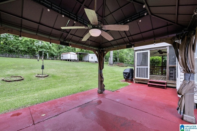 7741 John Pelham Trl, Mccalla, AL 35111 - view of patio / terrace featuring ceiling fan, a grill, and a storage unit