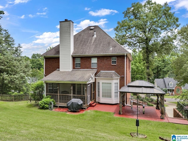 7741 John Pelham Trl, Mccalla, AL 35111 - rear view of house featuring a gazebo, roof with shingles, a sunroom, and a chimney