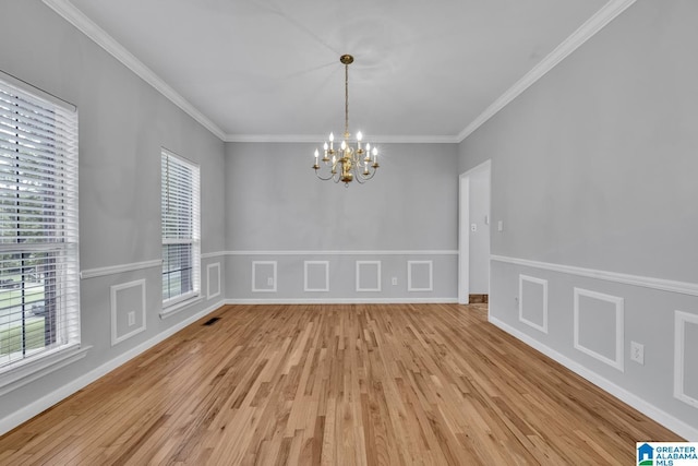7741 John Pelham Trl, Mccalla, AL 35111 - unfurnished dining area with a chandelier, light wood-style flooring, and ornamental molding
