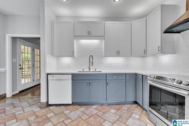 7741 John Pelham Trl, Mccalla, AL 35111 - kitchen with stainless steel range with electric stovetop, white dishwasher, wall chimney range hood, light countertops, and recessed lighting