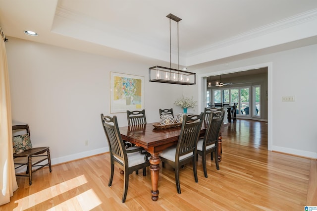 212 Bellbrook Dr, Cropwell, AL 35054 - dining area featuring crown molding, light wood-type flooring, a raised ceiling, and recessed lighting